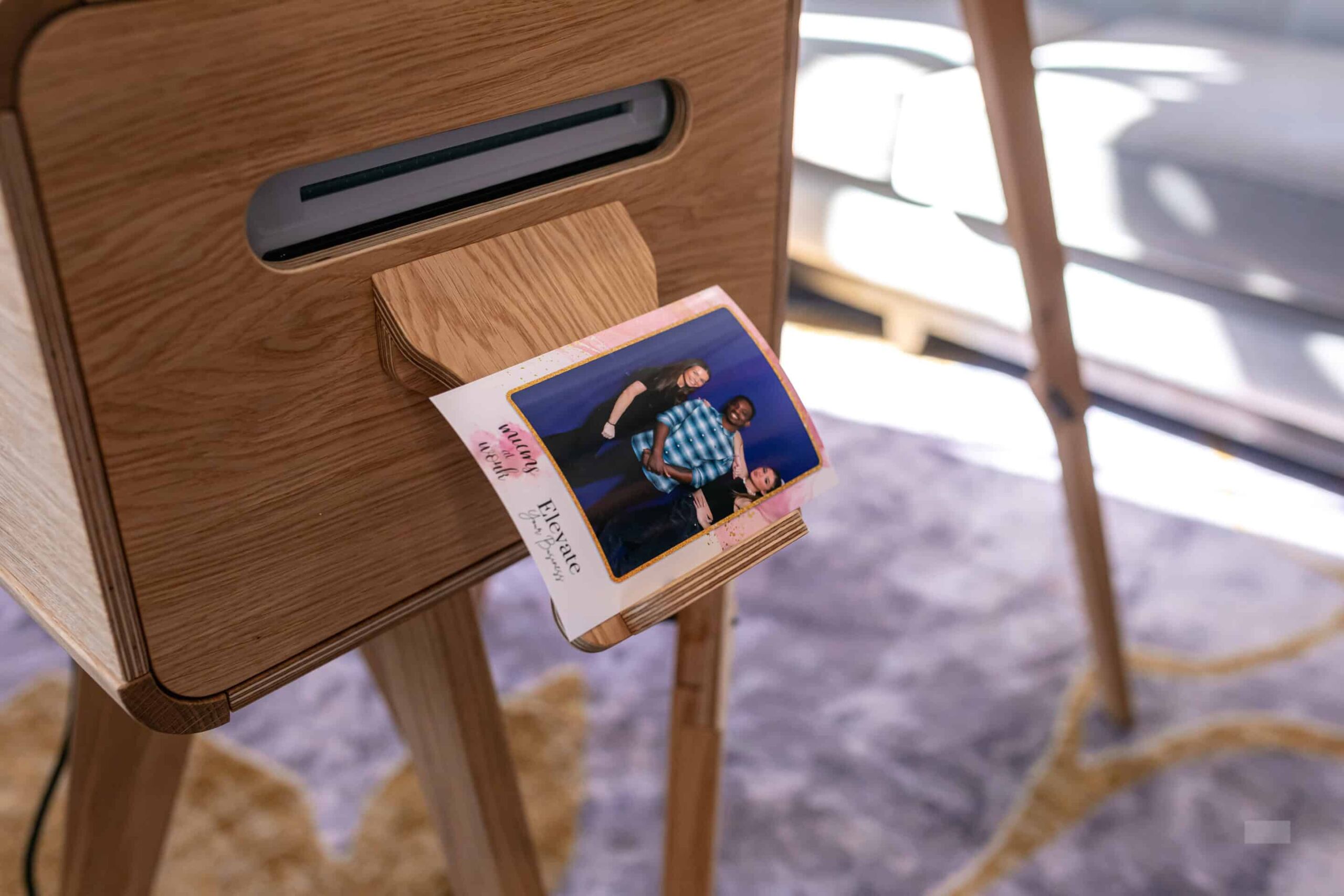 Guests pose at the Calgary Glam Booth open-air photo booth during a party and corporate event.